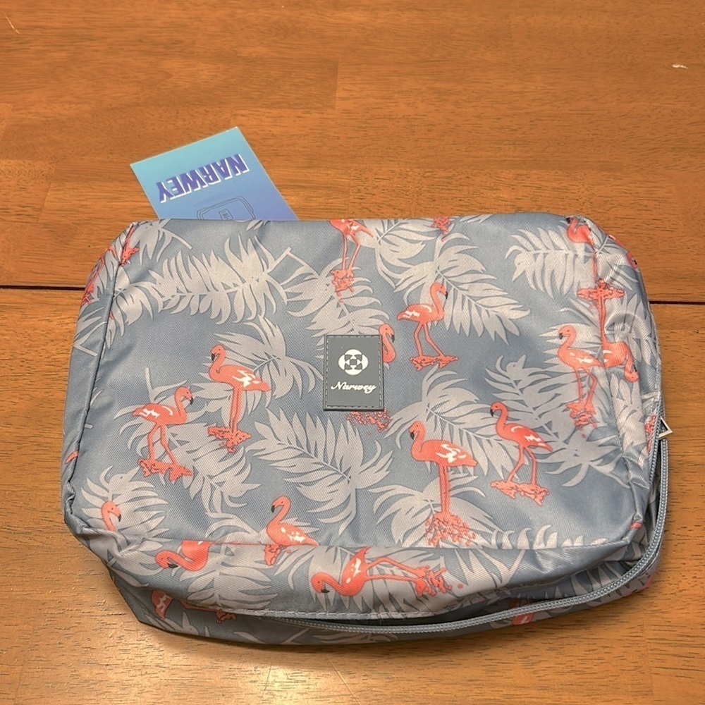 Cute flamingo hanging toiletry bag, never used.